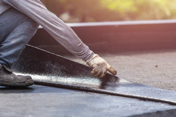 Professional Basement Waterproofing technician working in Burlington, NJ